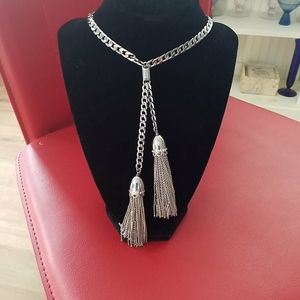 Silver tone necklace with tassels